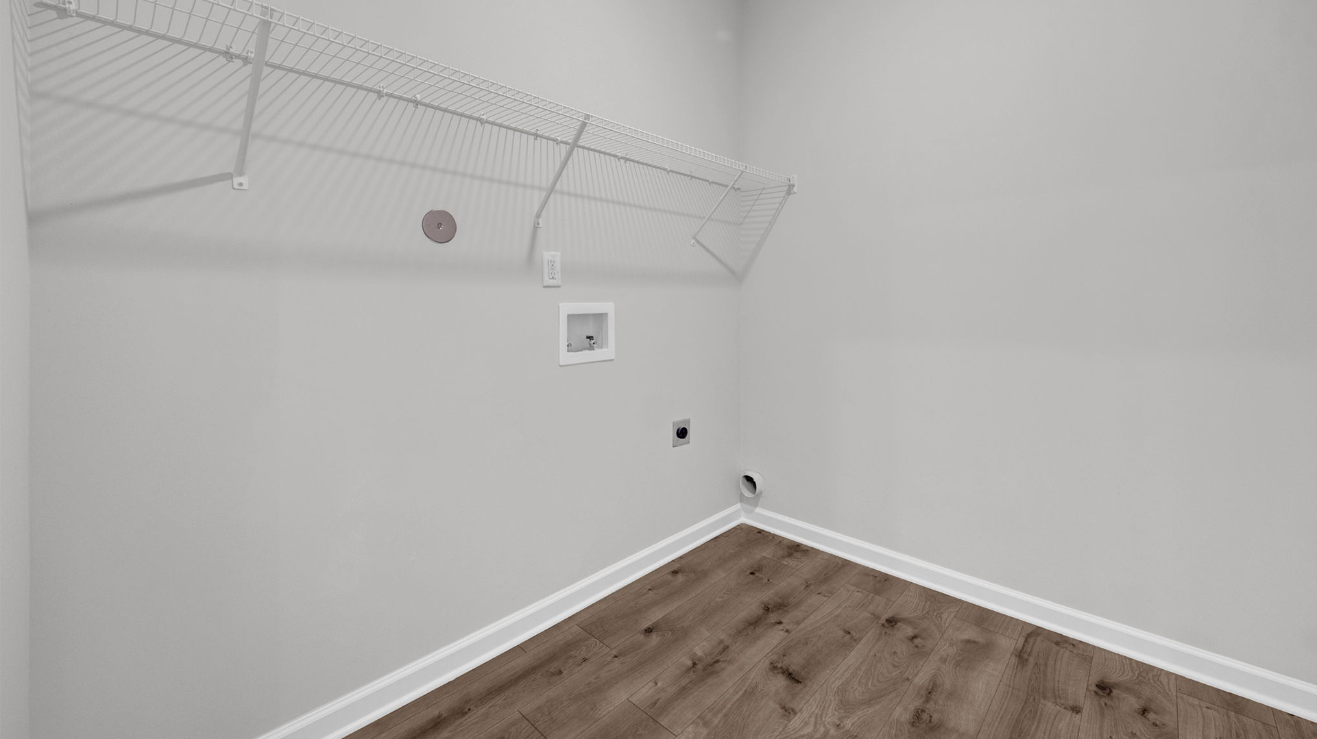 Laundry room with ventilated shelving