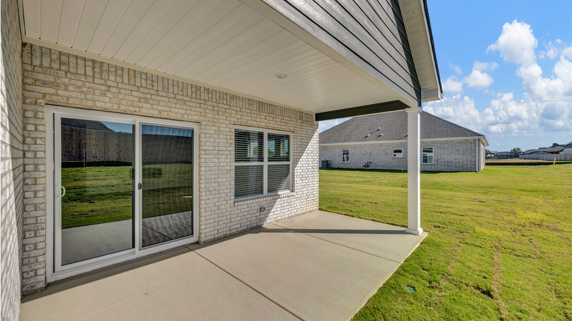 Spacious covered back patio perfect for entertaining