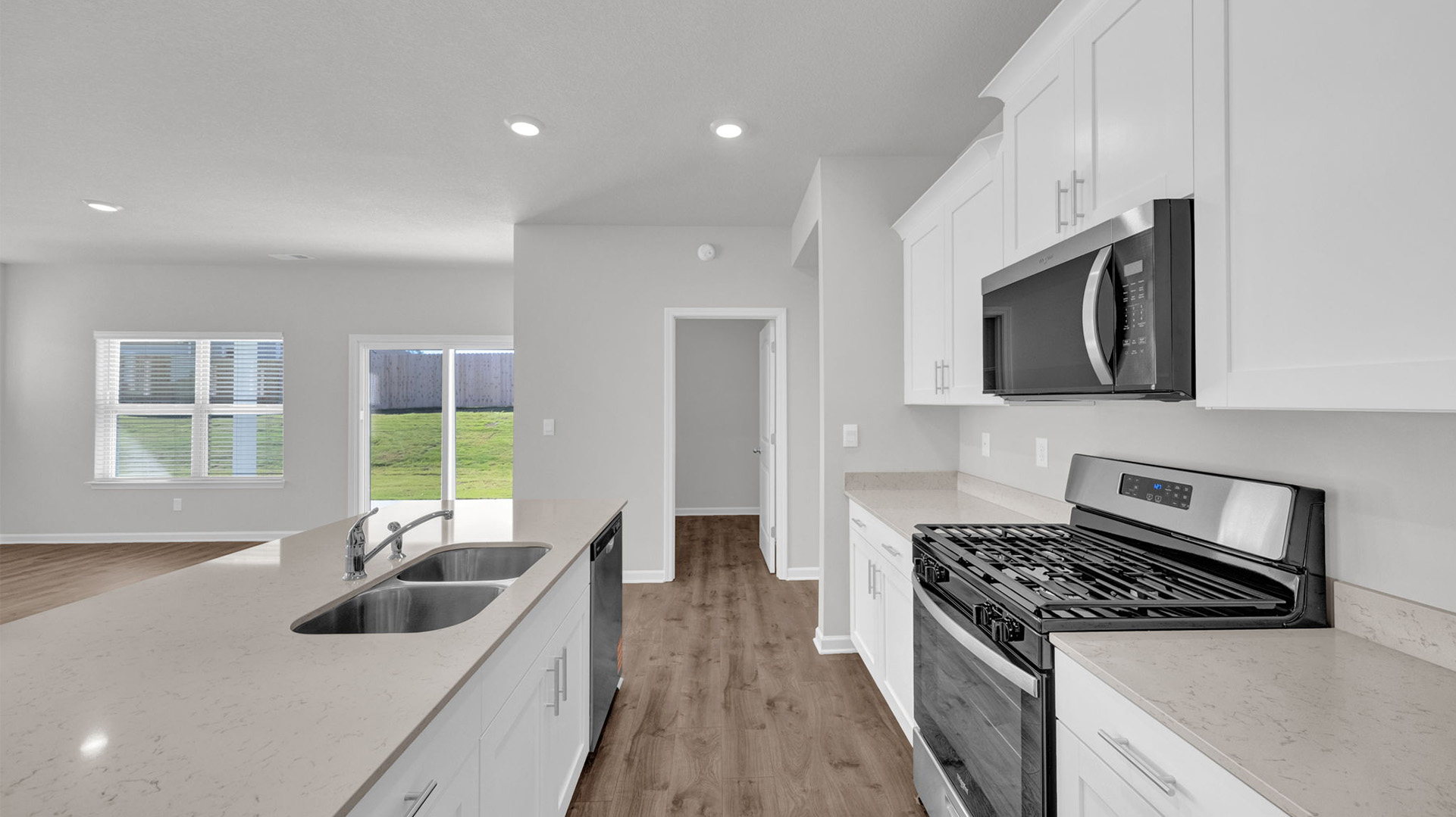 Laundry room located right off of the kitchen area