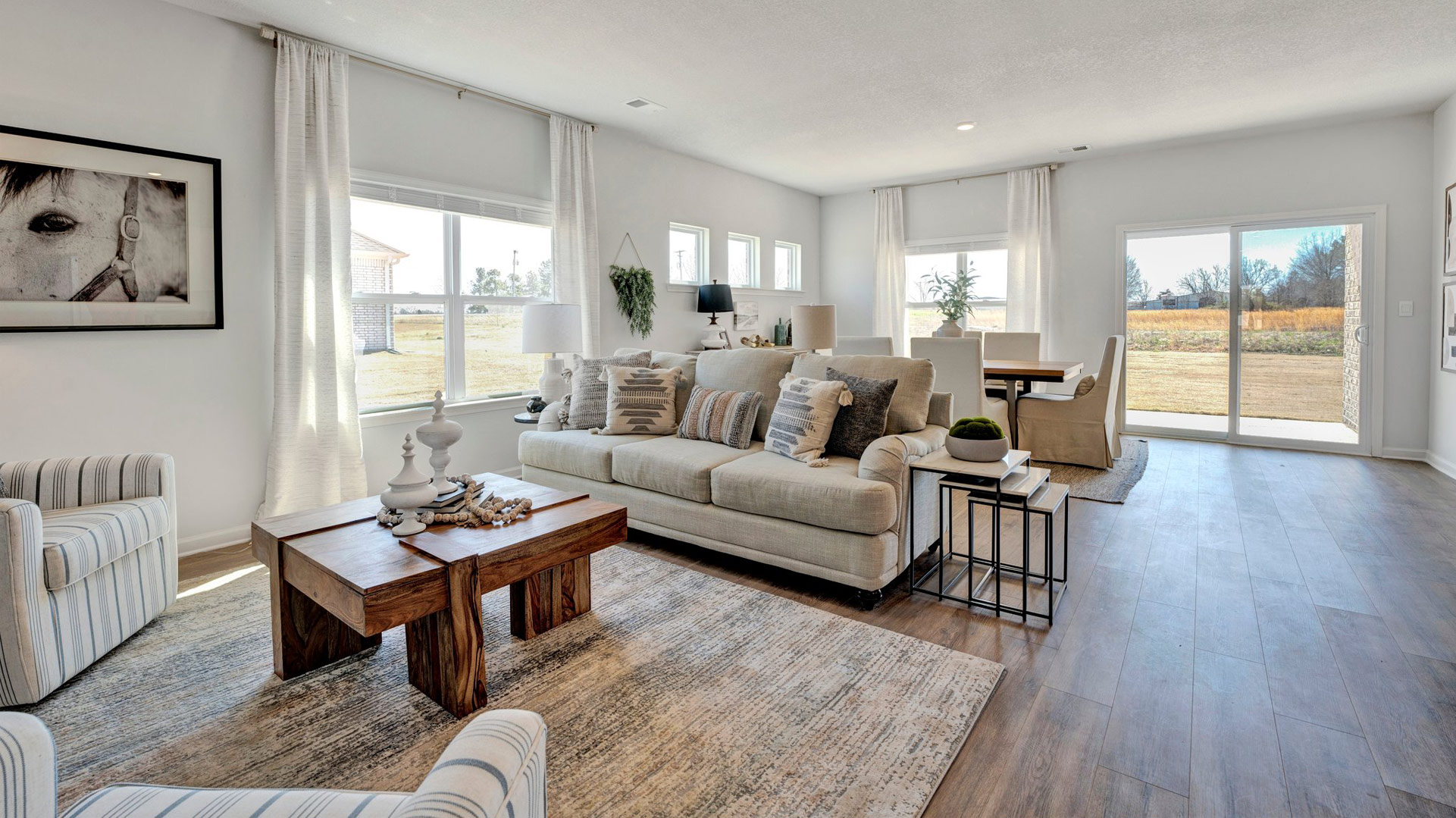 Living room built for daily living, entertaining with ample space, electric fireplace, stylish open concept designs