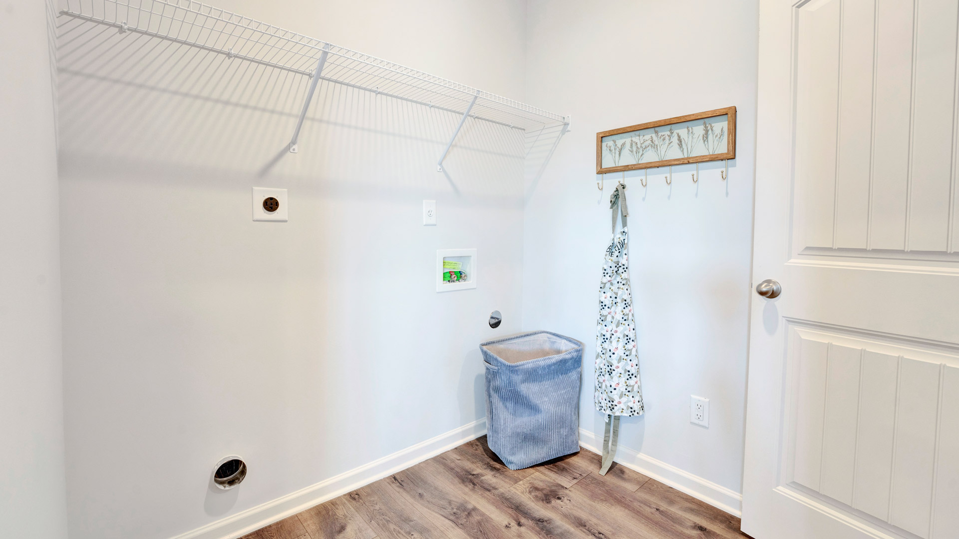Shiloh Springs utility laundry smartly designed with overhead organized storage, a drop zone, with new washer, dryer included
