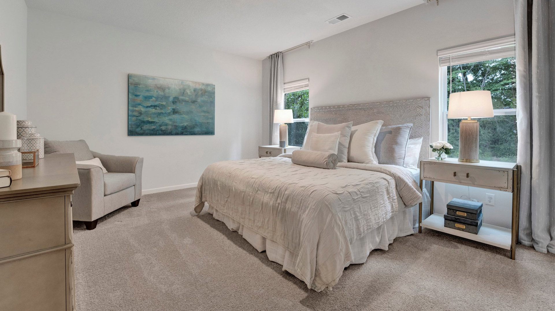 Primary bedroom comfortably fits a king size bed