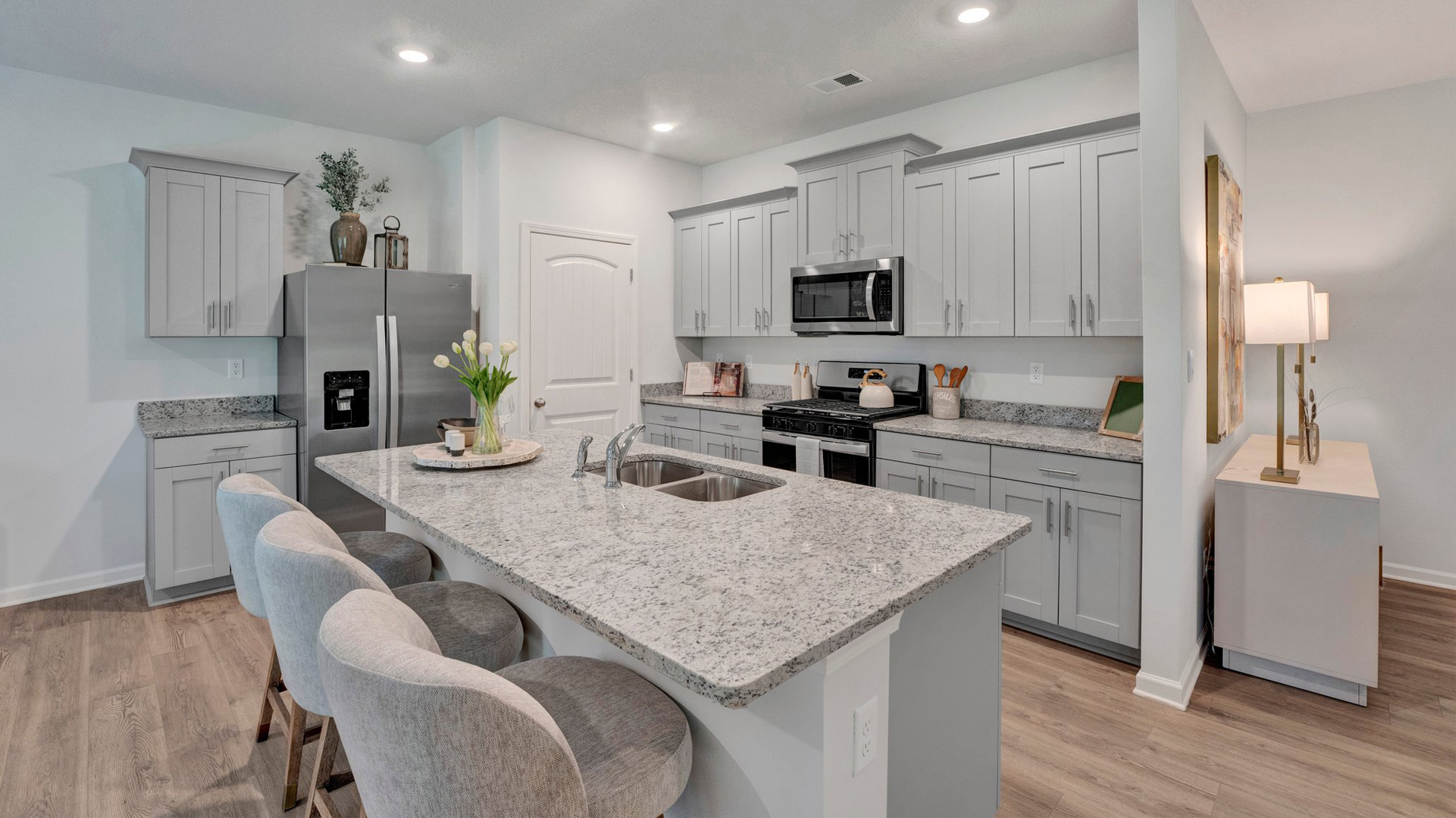 Beautiful kitchen area with granite countertops