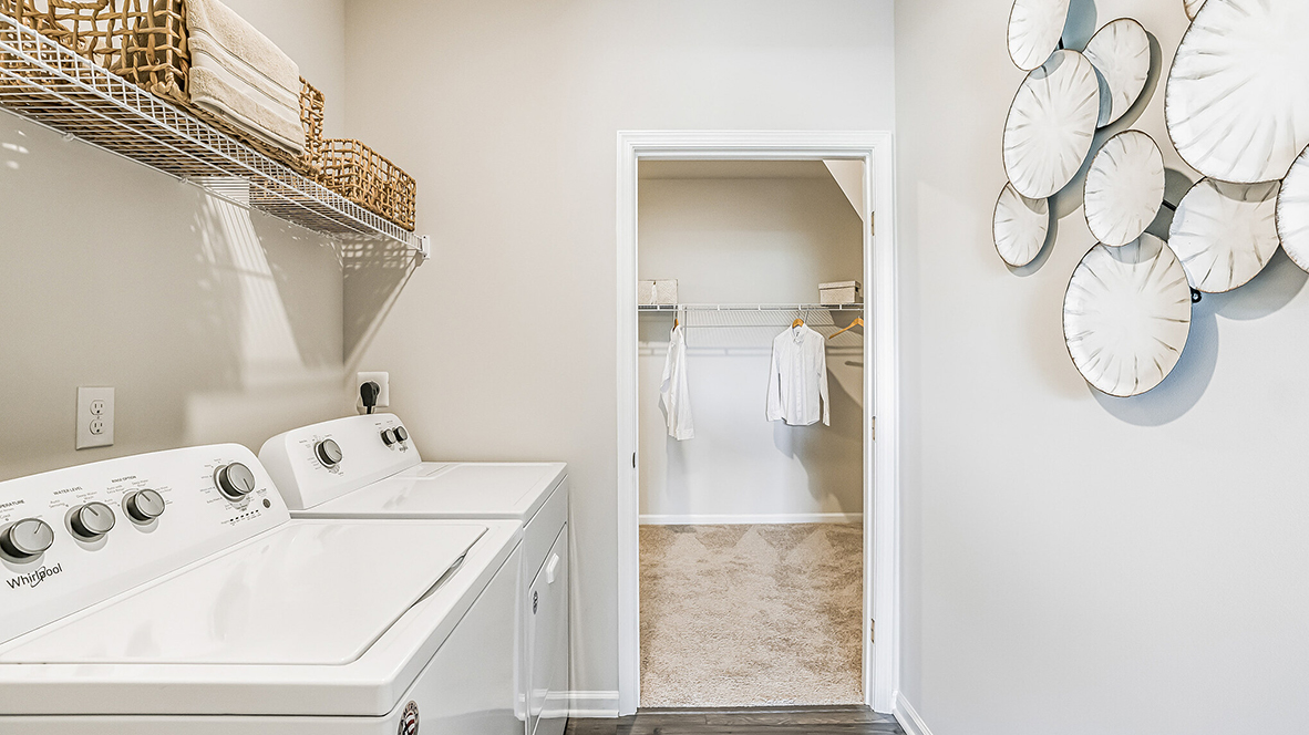 Laundry room with ventilated shelving