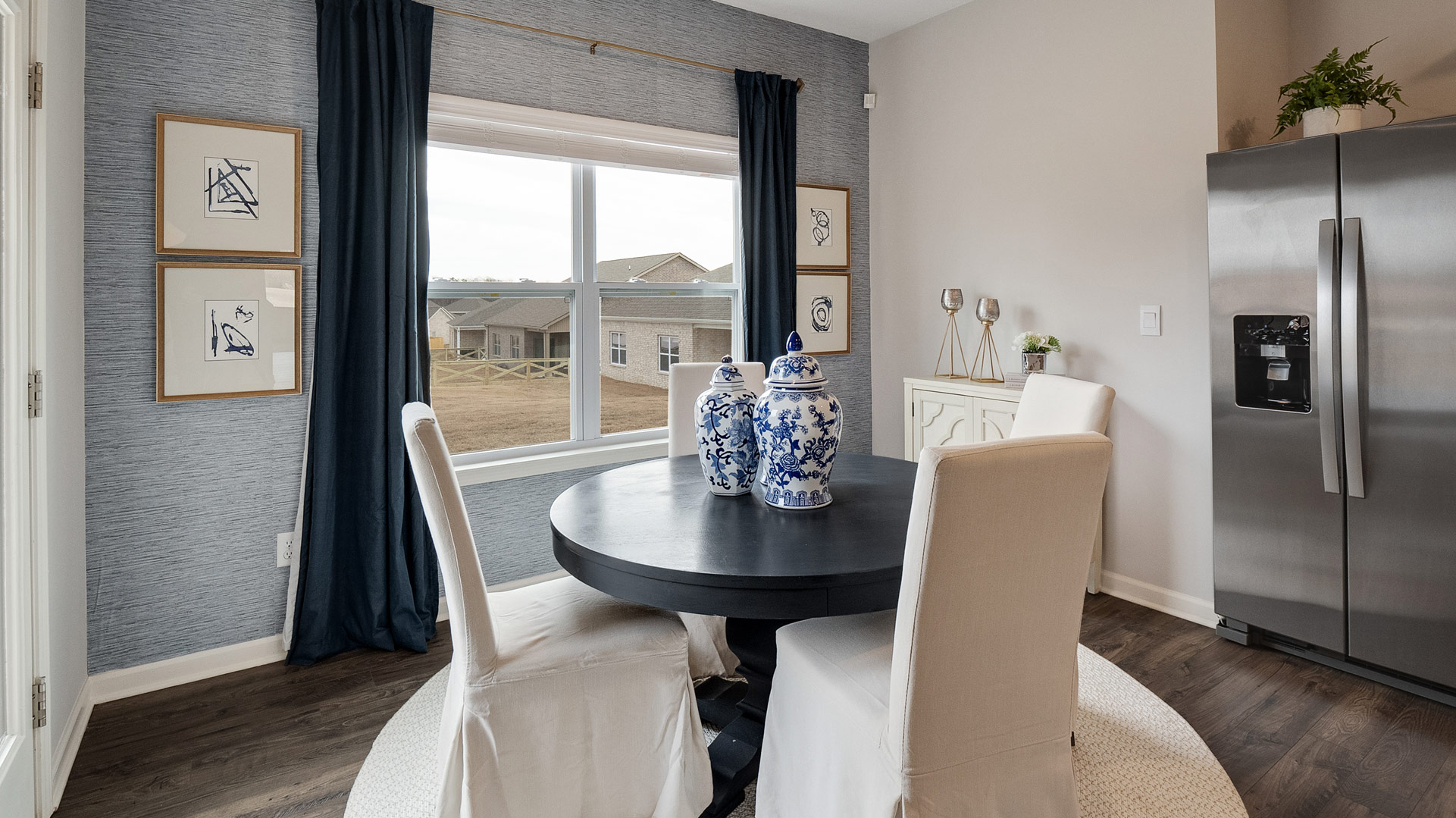 Dining area in Shiloh Springs is ready for entertaining, or everyday living in the kitchen, living room, upstairs access