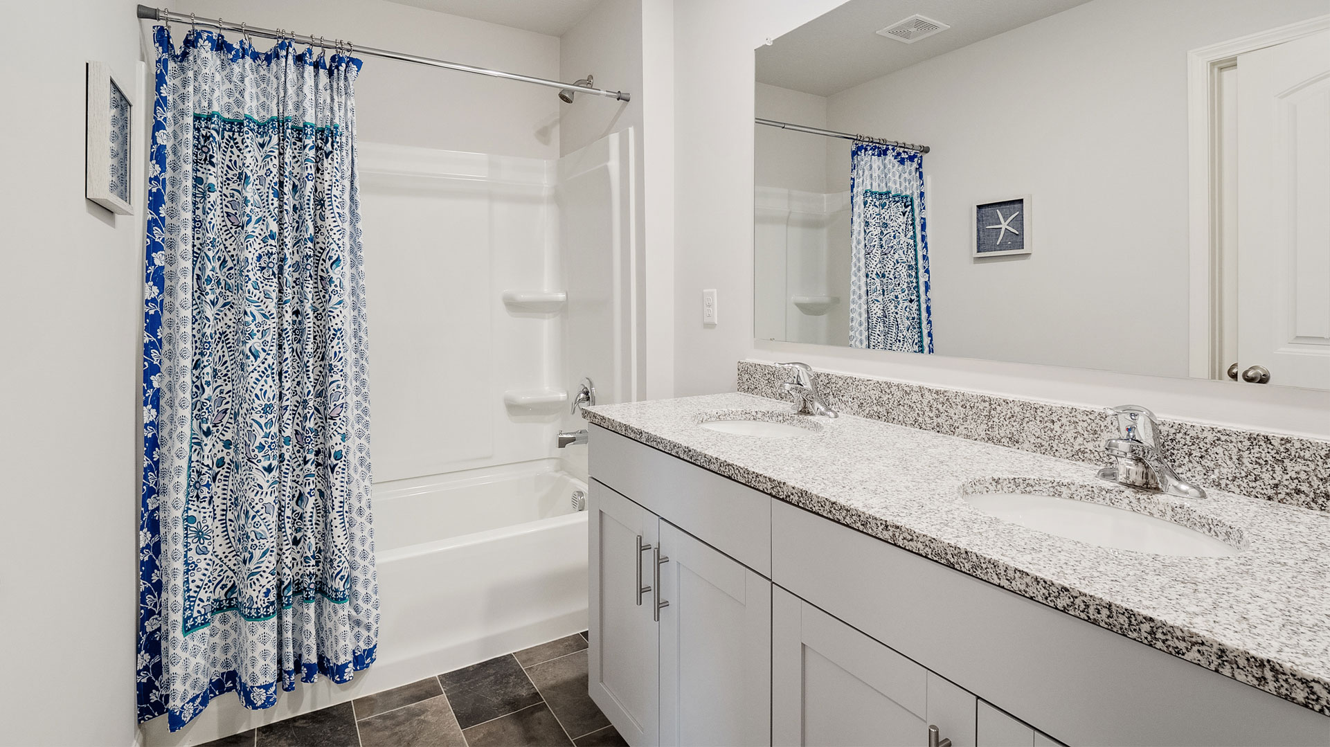 Family full upstairs bathroom adds stylish vanity, mirror, polished fixtures, cabinets, tub-shower combo, Shiloh Springs