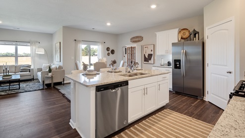 Spacious kitchen island overlooking main living areas