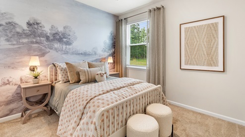 Third bedroom with a single window overlooking the side yard