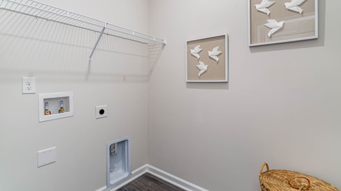 Laundry room with ventilated shelving