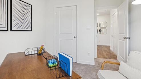 Fourth bedroom with carpet flooring