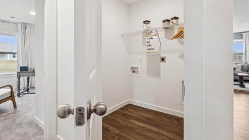 Laundry room with ventilated shelving