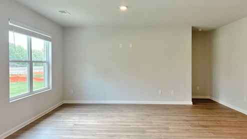 Living room with large double window for natural light