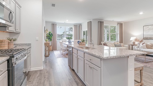 Spacious kitchen island overlooking the main living areas