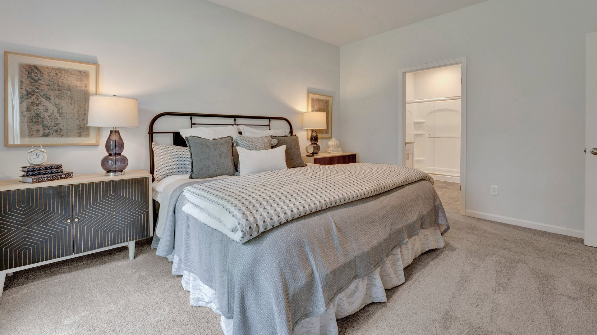 Primary bedroom comfortably fits a king size bed