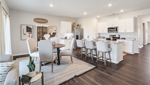 Open concept view of the dining and kitchen area
