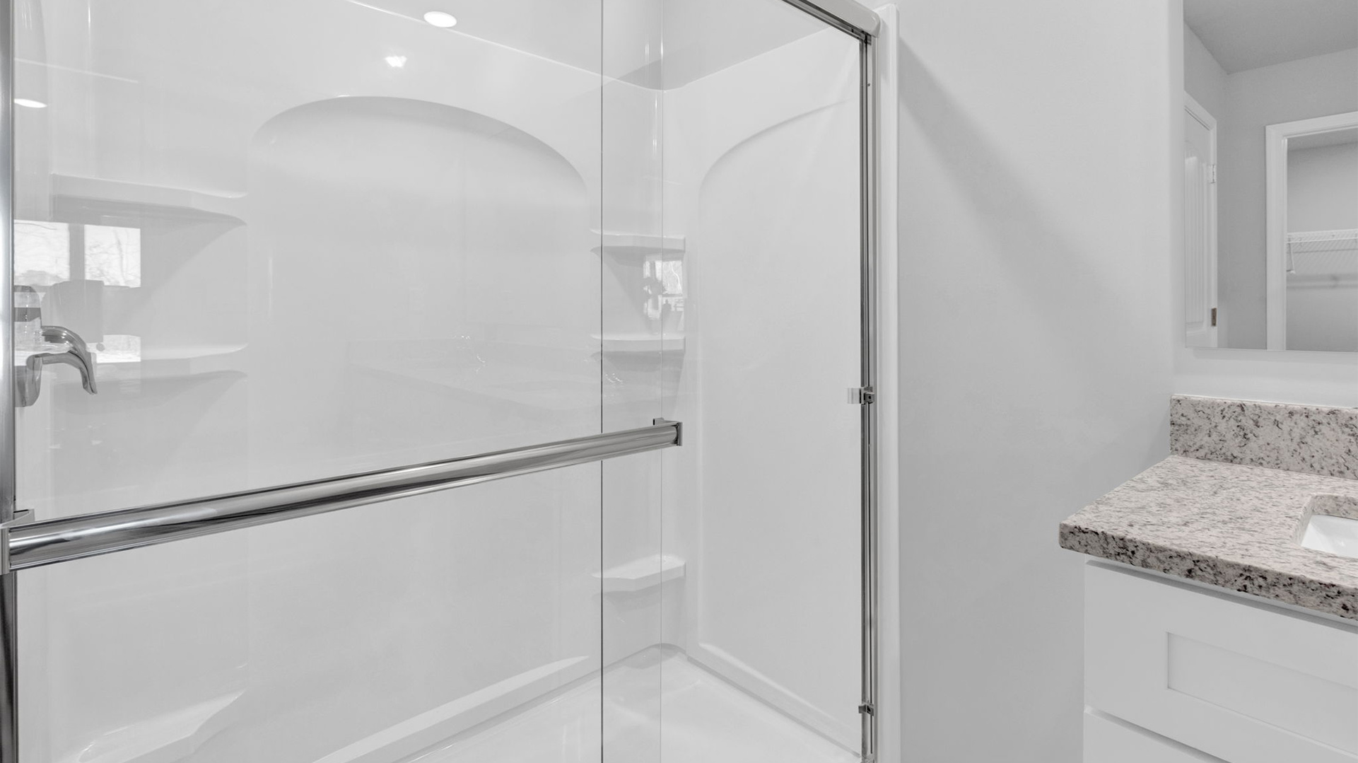 Glass enclosed walk in shower