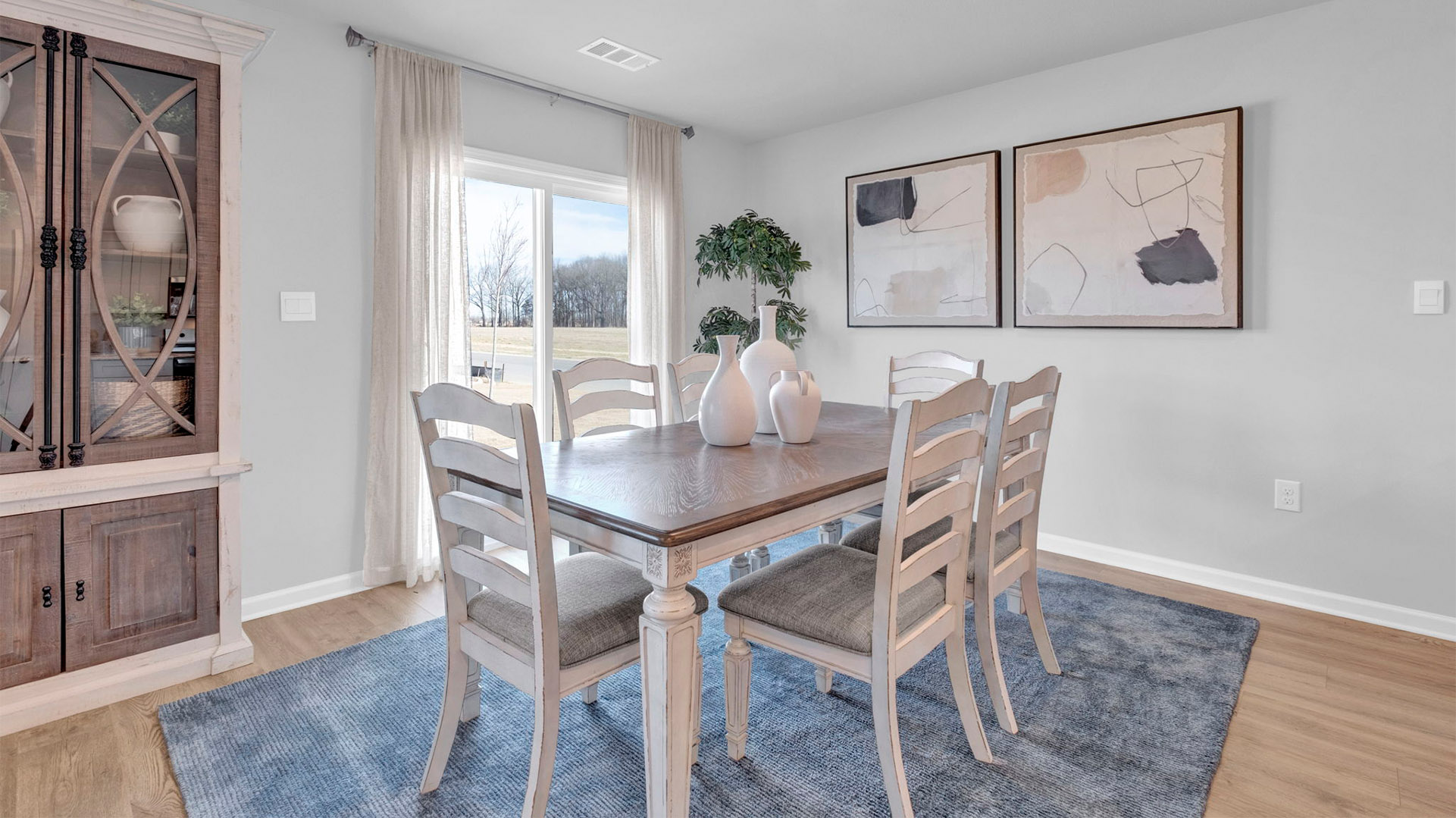 Beautiful dining area with close access out to covered patio