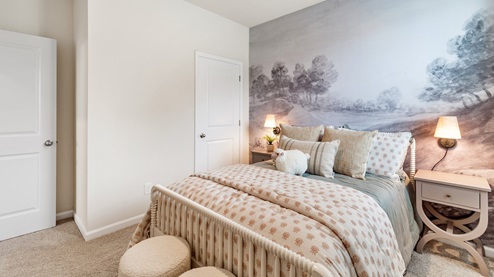 Third bedroom with neutral paint and carpet flooring