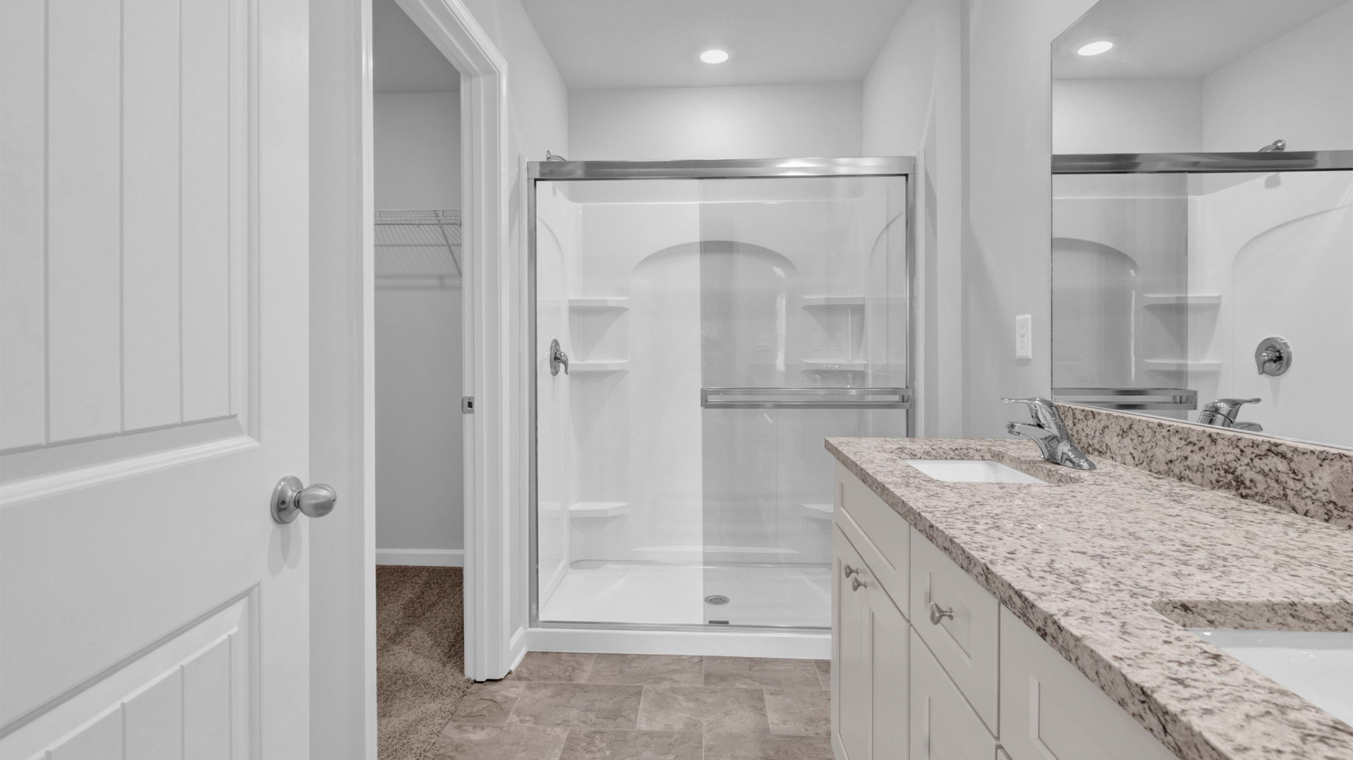 Glass enclosed walk in shower
