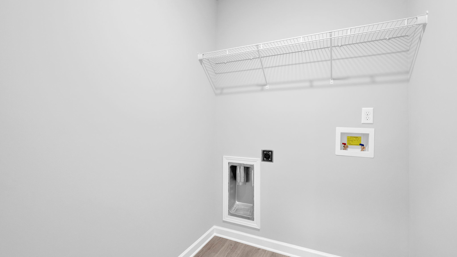 Laundry room with ventilated shelving