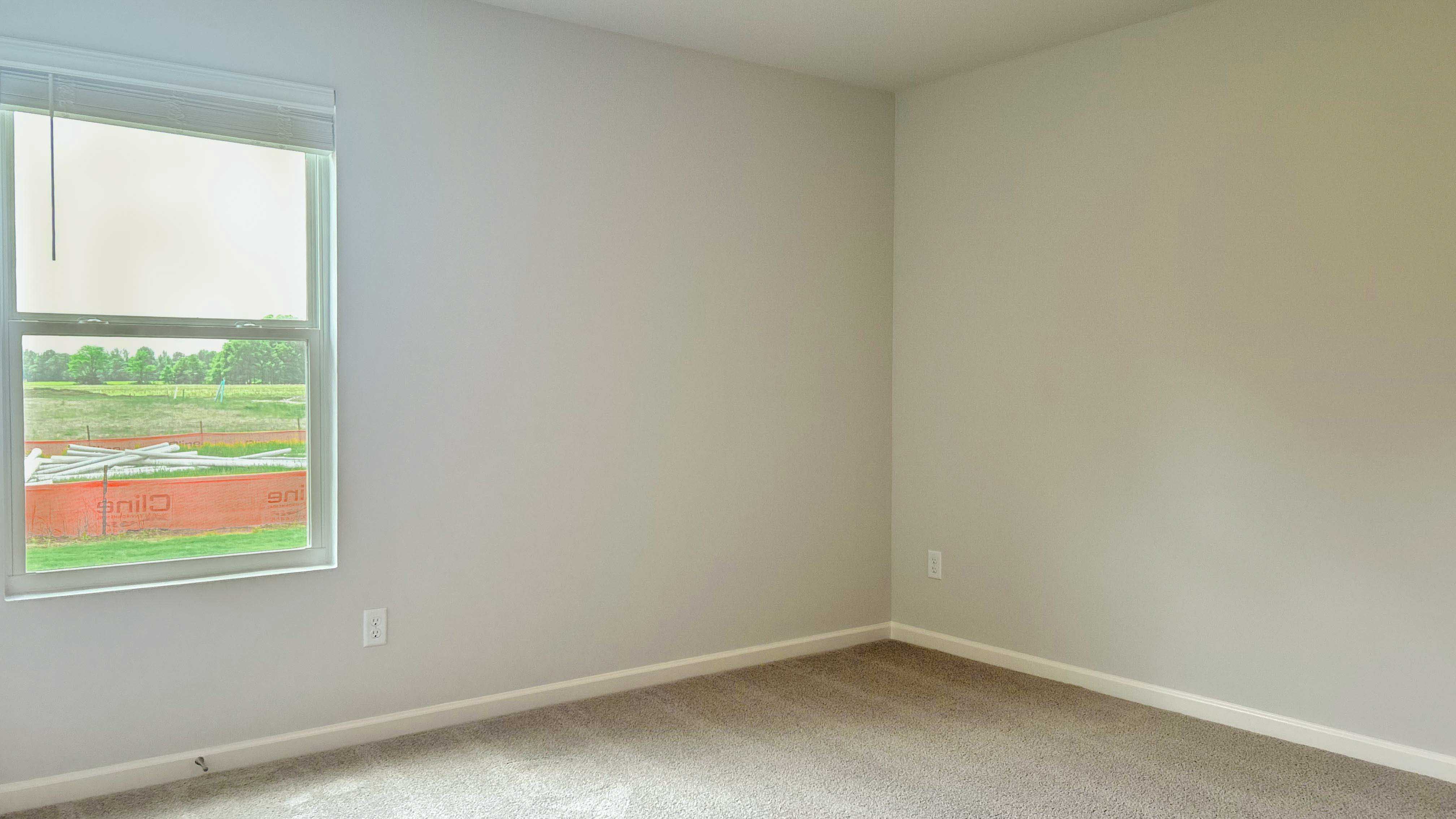 Fourth bedroom with a single window for natural light