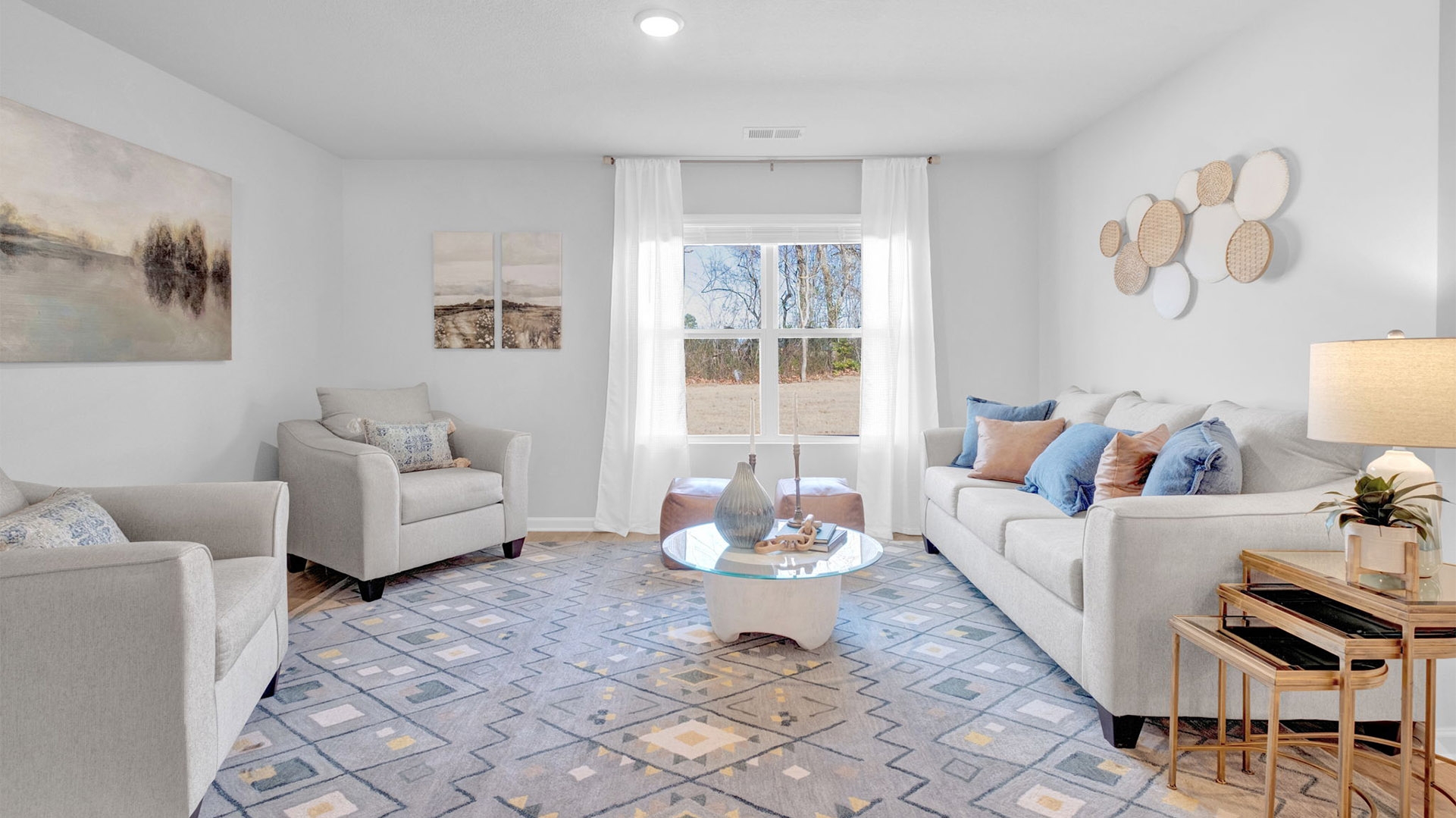 Living room open to the dining and kitchen