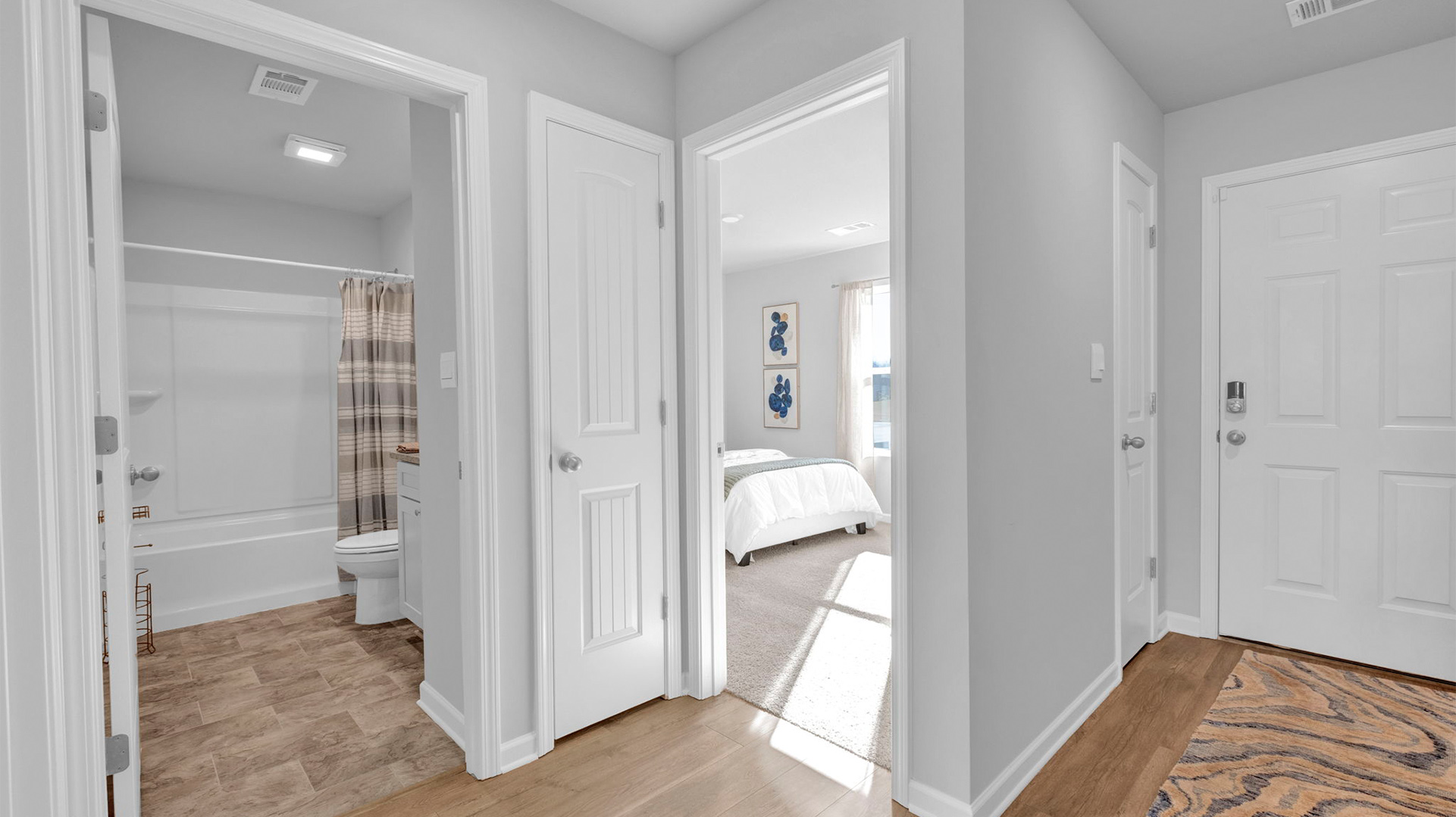 ENtry foyer leading into the front bedroom of the home