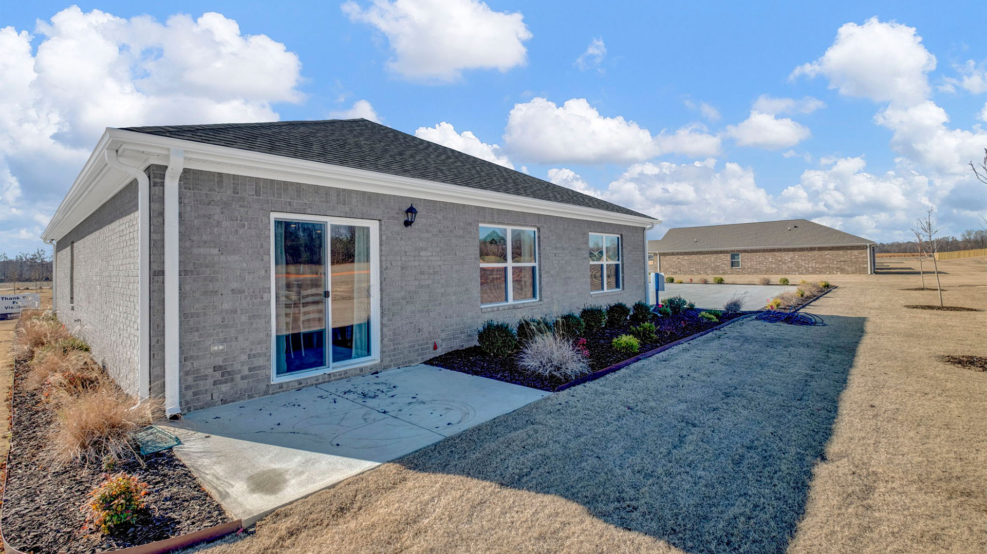 Back patio of the freeport plan perfect for entertaining guests