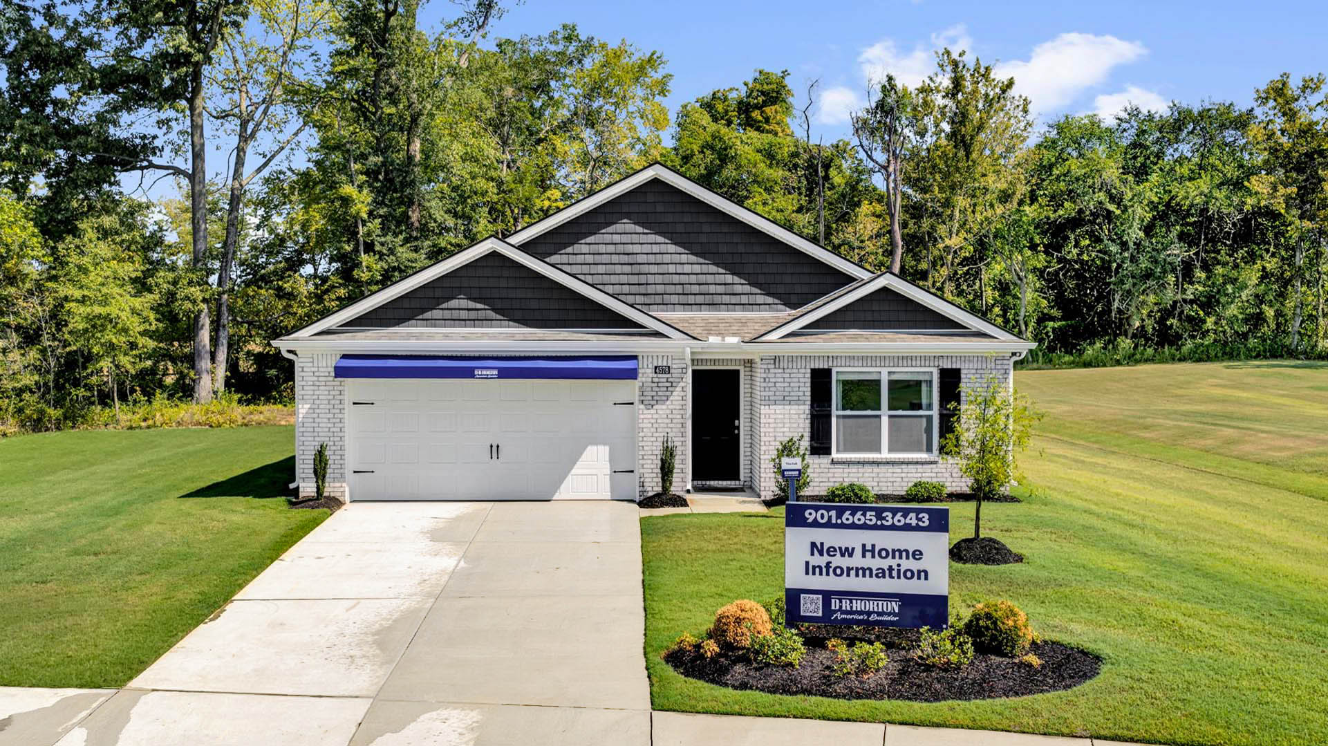 Beautiful exterior of our model home in Riggs Pointe
