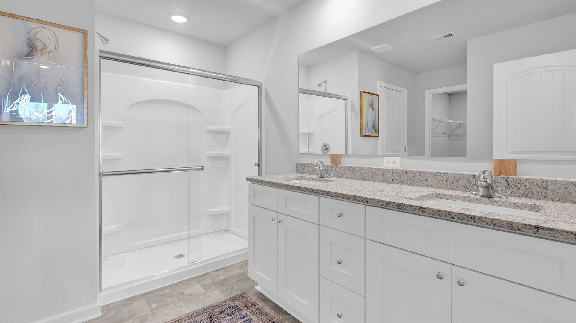 EN suite primary bathroom with a dual vanity