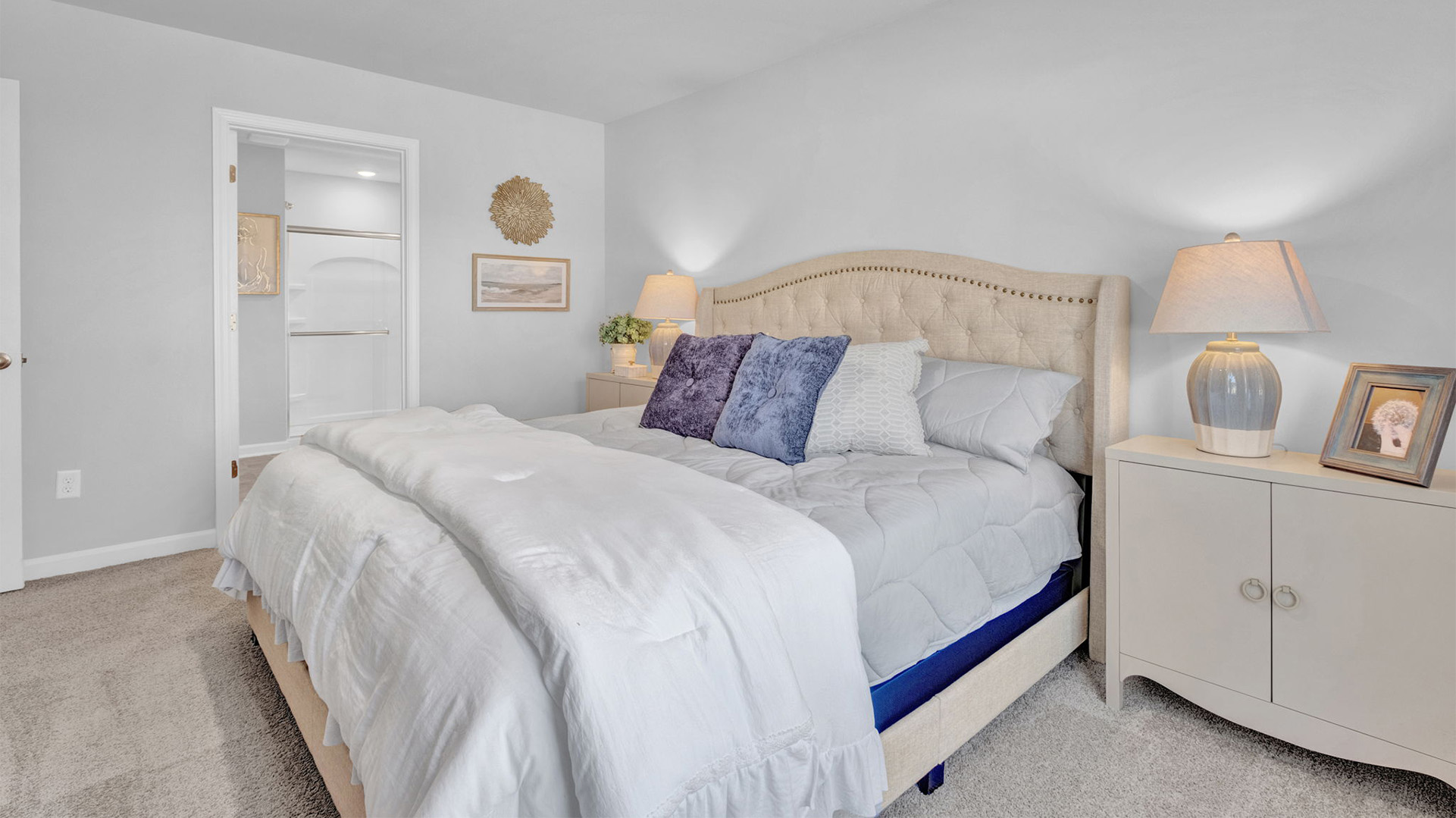 Primary bedroom comfortably fits a king size bed