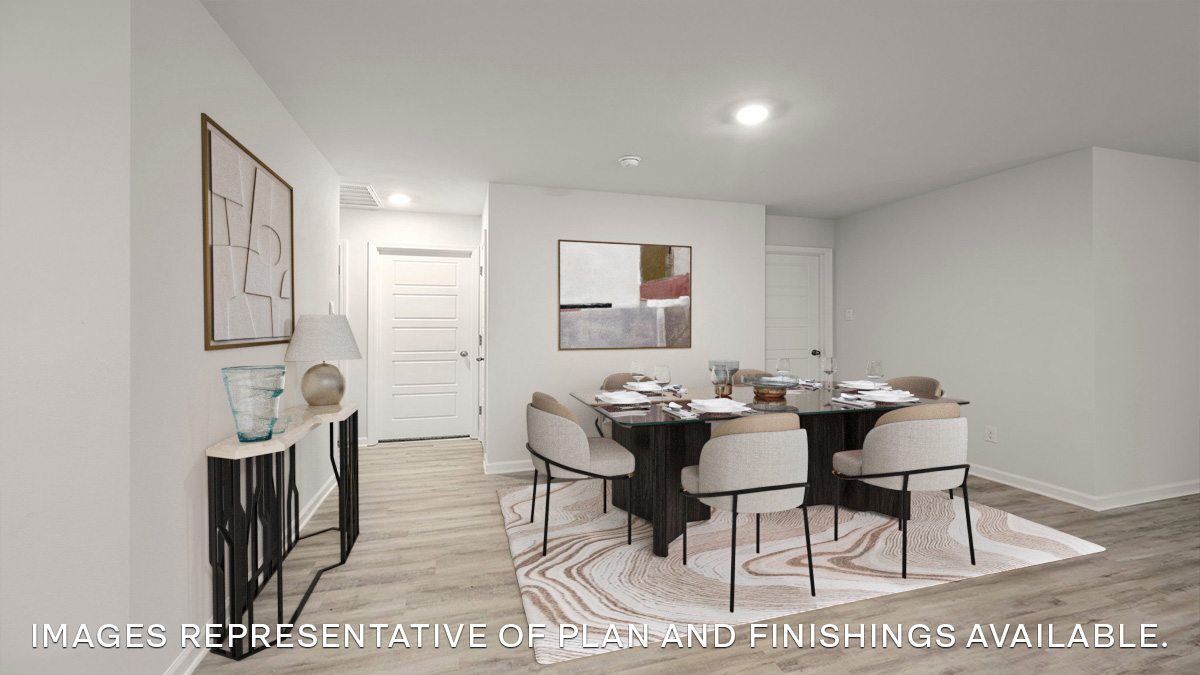 Dining room opens up at the end of entry hall