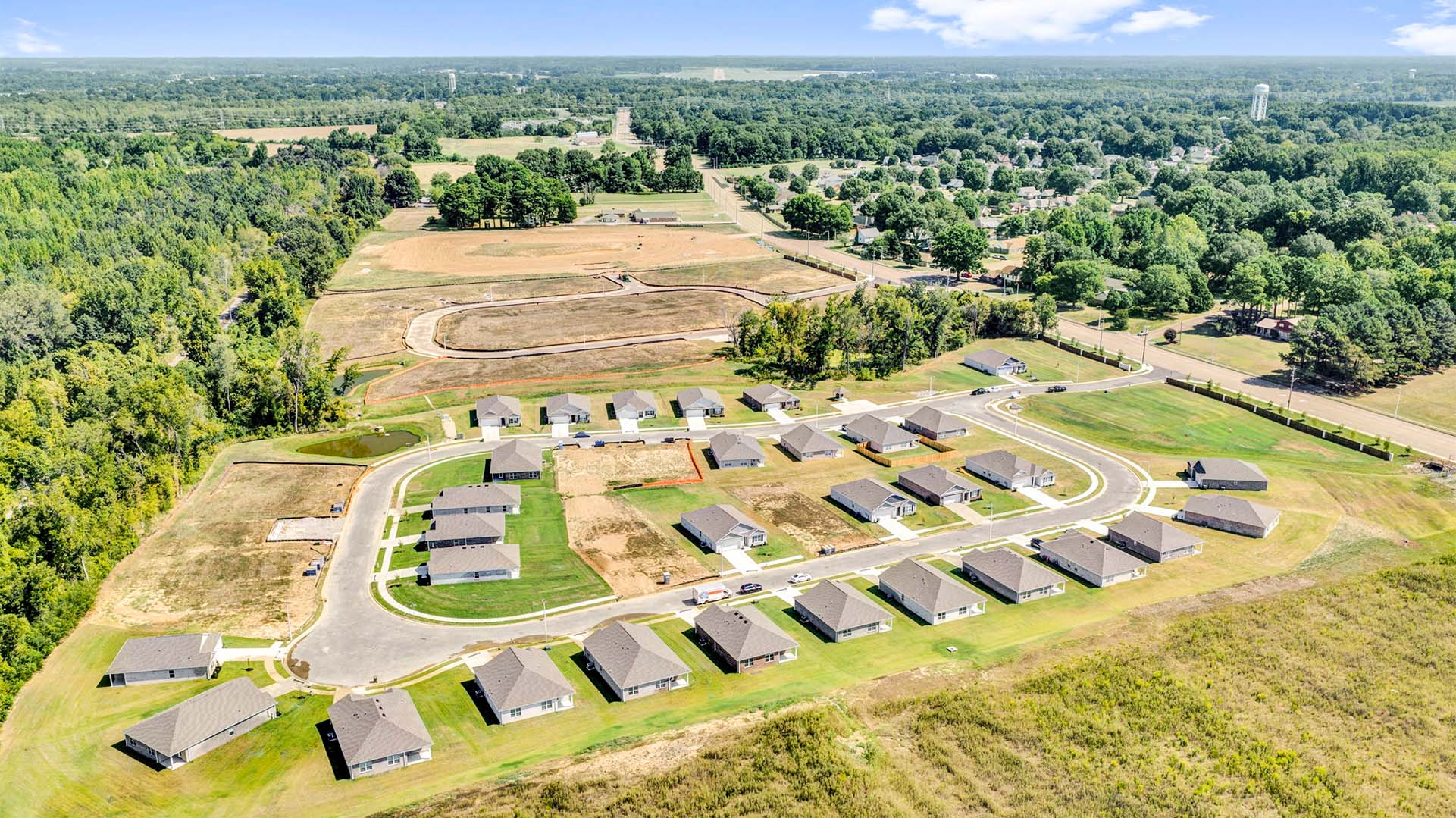 Drone view of the growing community at Riggs Pointe