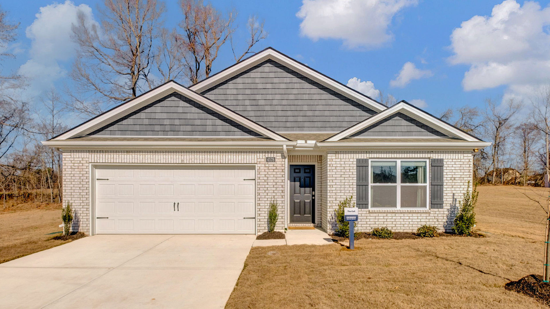 Exterior of the Riggs Pointe model the cali floorplan in Millington