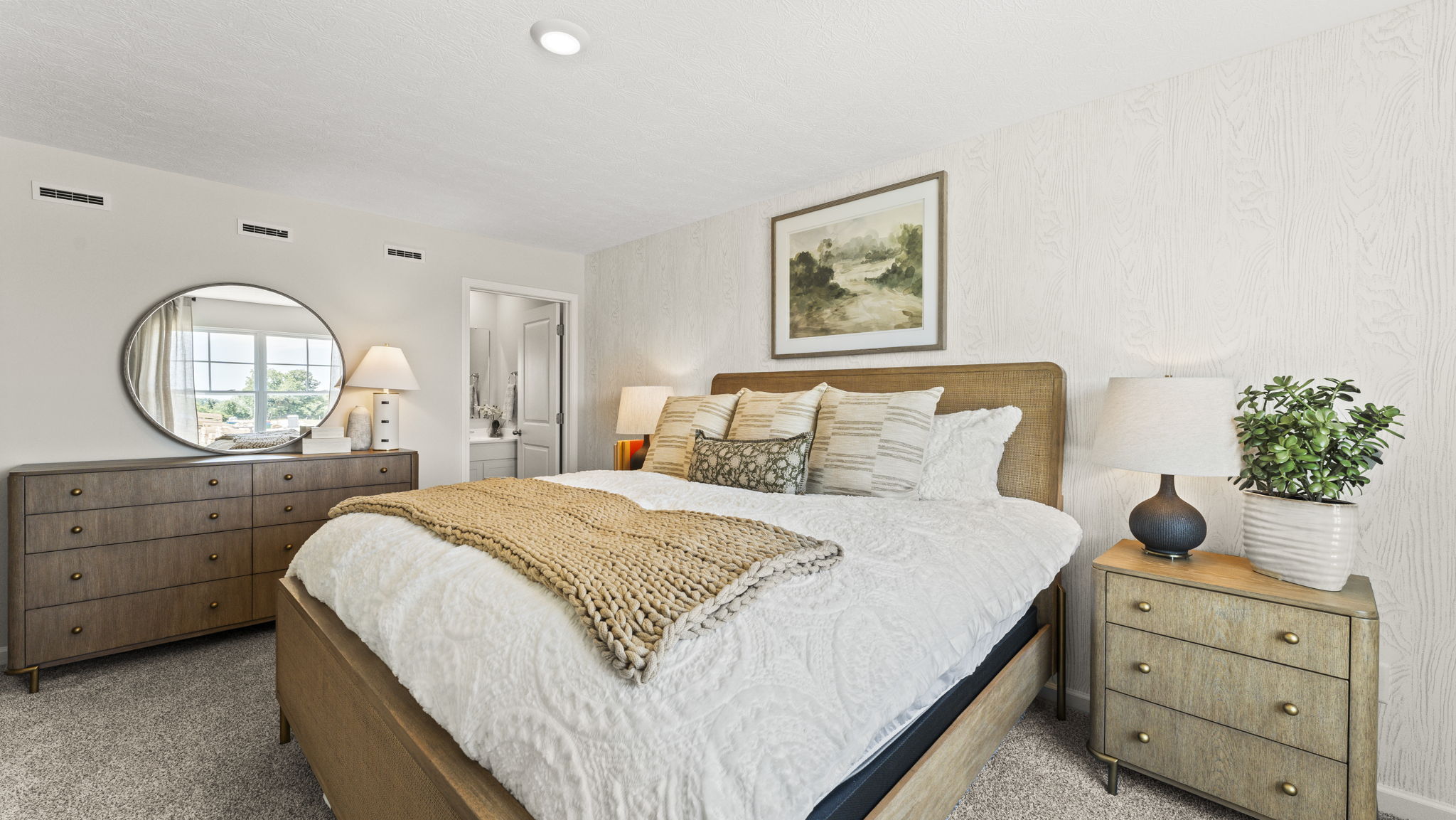 Primary bedroom comfortably fits a king size bed