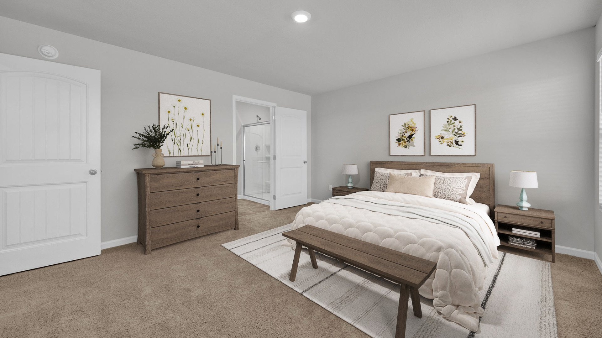 Spacious primary bedroom comfortably fitting a king size bed