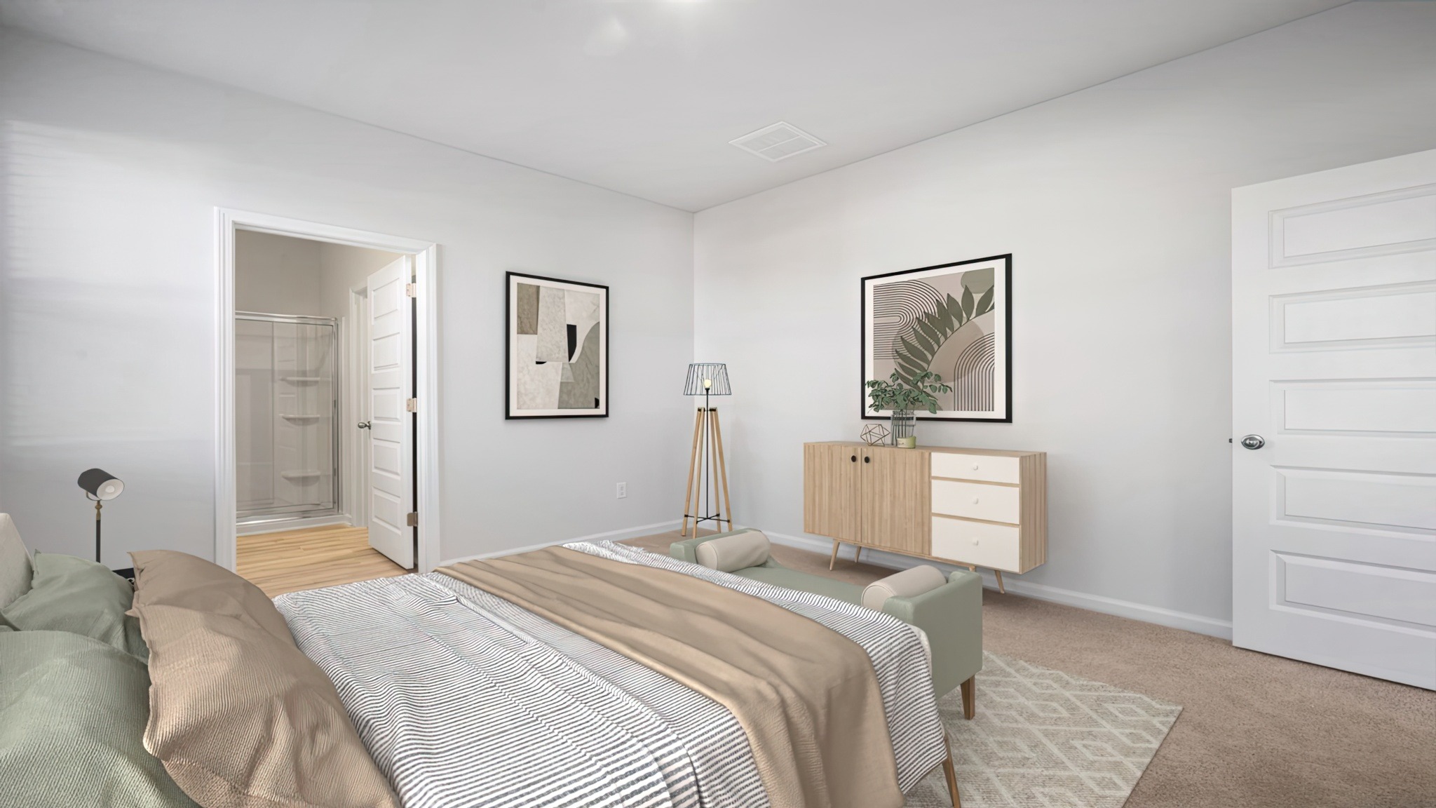 Spacious primary bedroom comfortably fits a king size bed and additional bedroom furniture