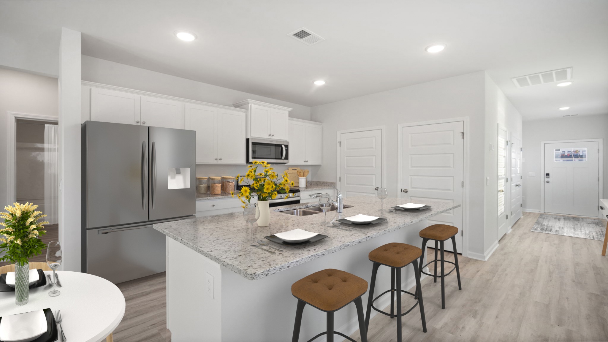 Kitchen area with a spacious kitchen island perfect for entertaining