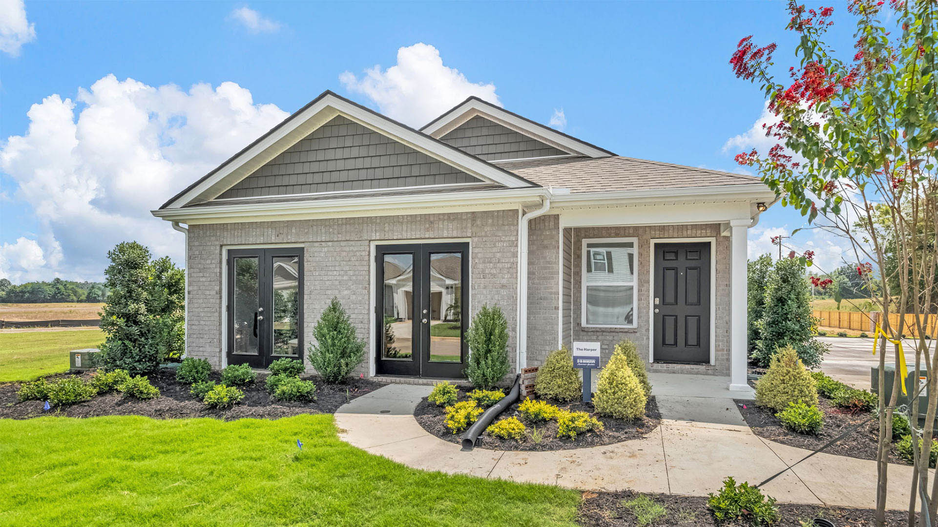 Close up of the Harper floorplan model home in this community
