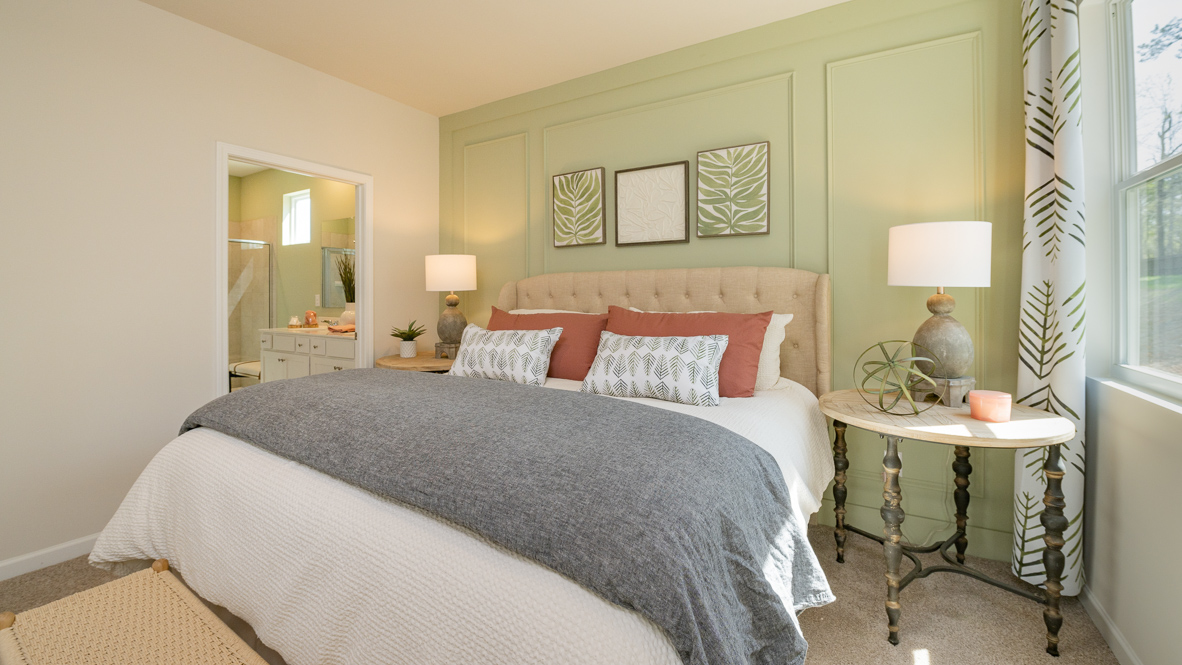 Primary bedroom comfortably fits a king size bed