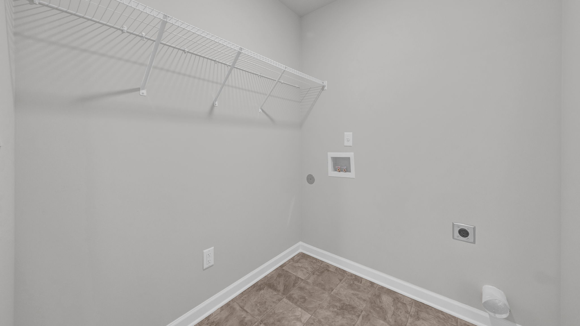 Laundry room with ventilated shelving