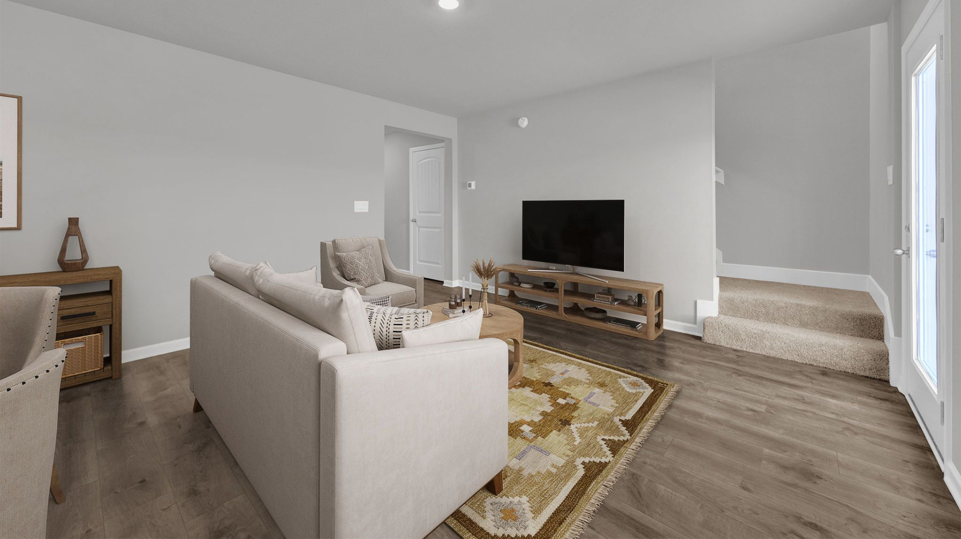 Living room with vinyl flooring and neutral paint