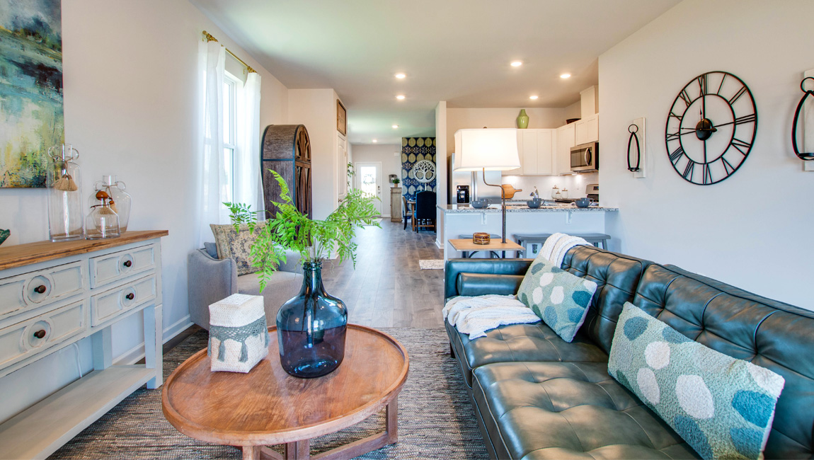 Open concept view of the living room overlooking the kitchen area