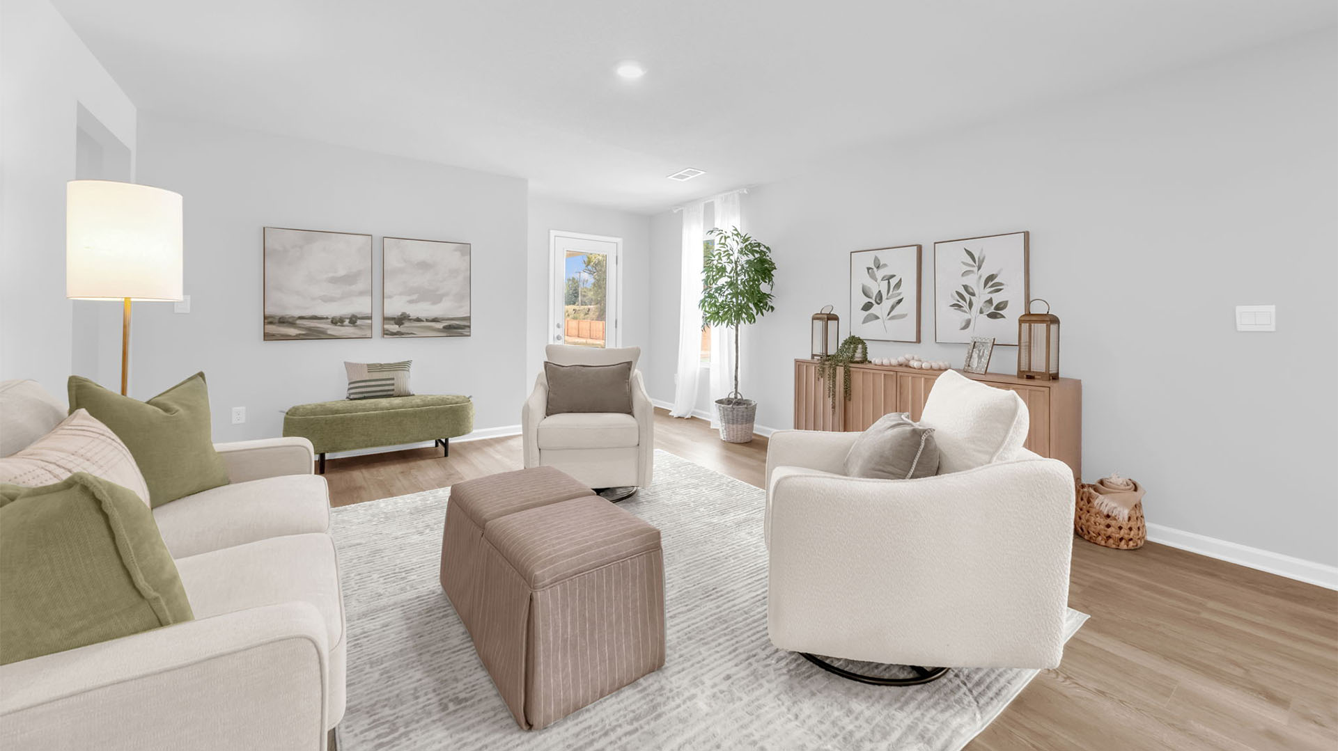 Spacious living room with close access out to covered patio