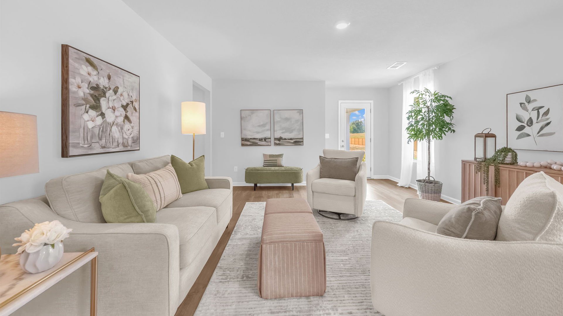 Spacious living room with neutral walls and vinyl flooring