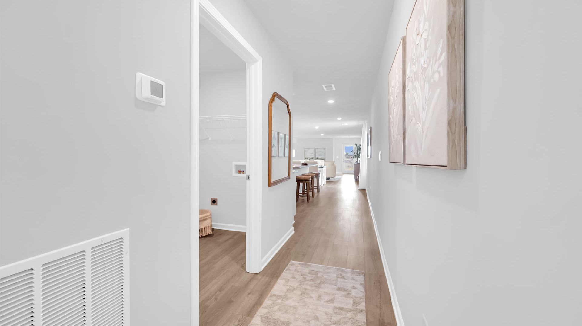 Front door entryway leading into the kitchen area