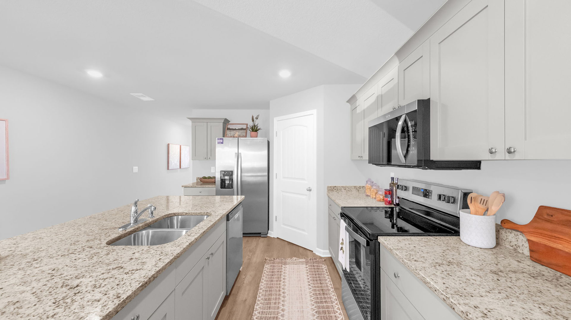 Kitchen area with vinyl flooring