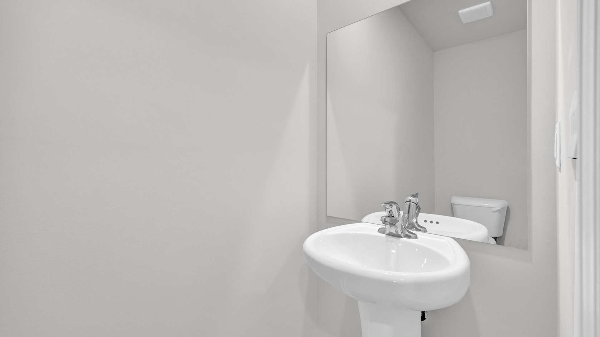 Half bath on the first story with a sink