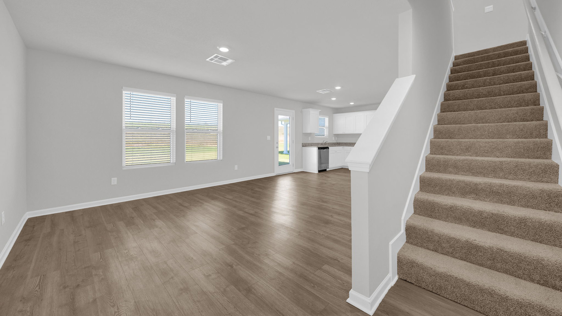 Stairway leading into the second floor overlooking the living room