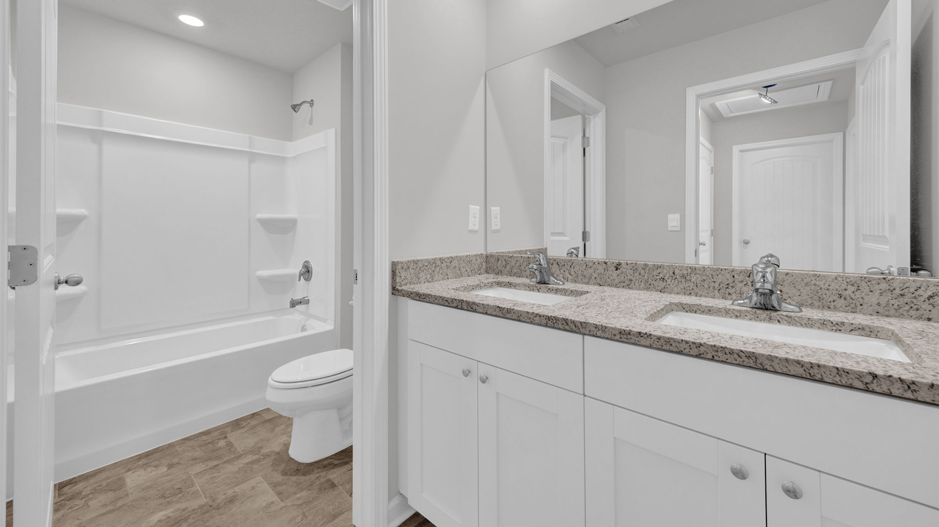 Second bathroom on the second floor with a dual vanity